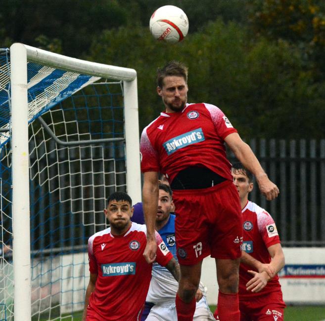 Dave Edwards clears the danger for Bala Town